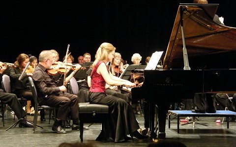 Melanie Lina playing