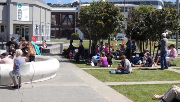 audience in the shade